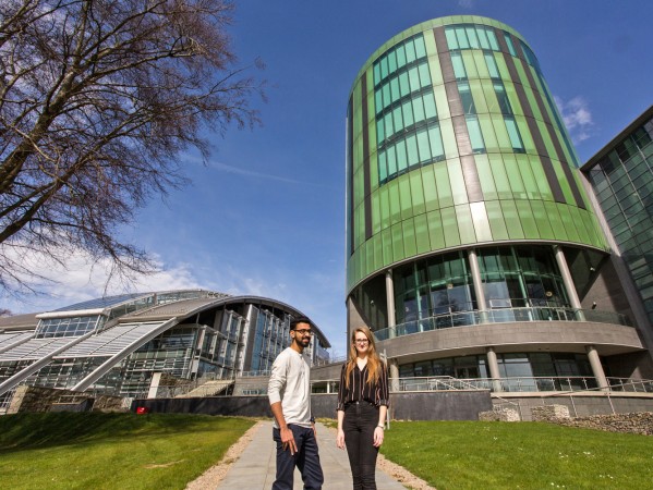 Two students stand on RGU campus