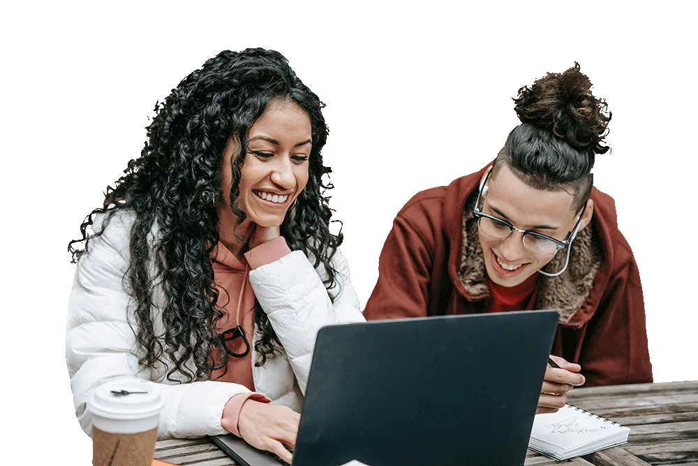 students around a laptop