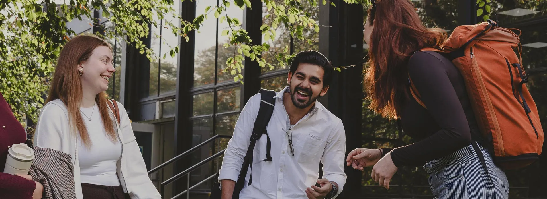 Students on campus laughing