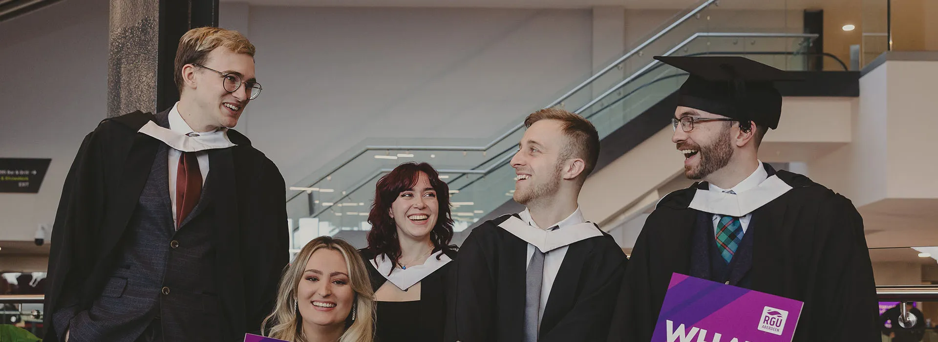 Graduates in gowns and hats