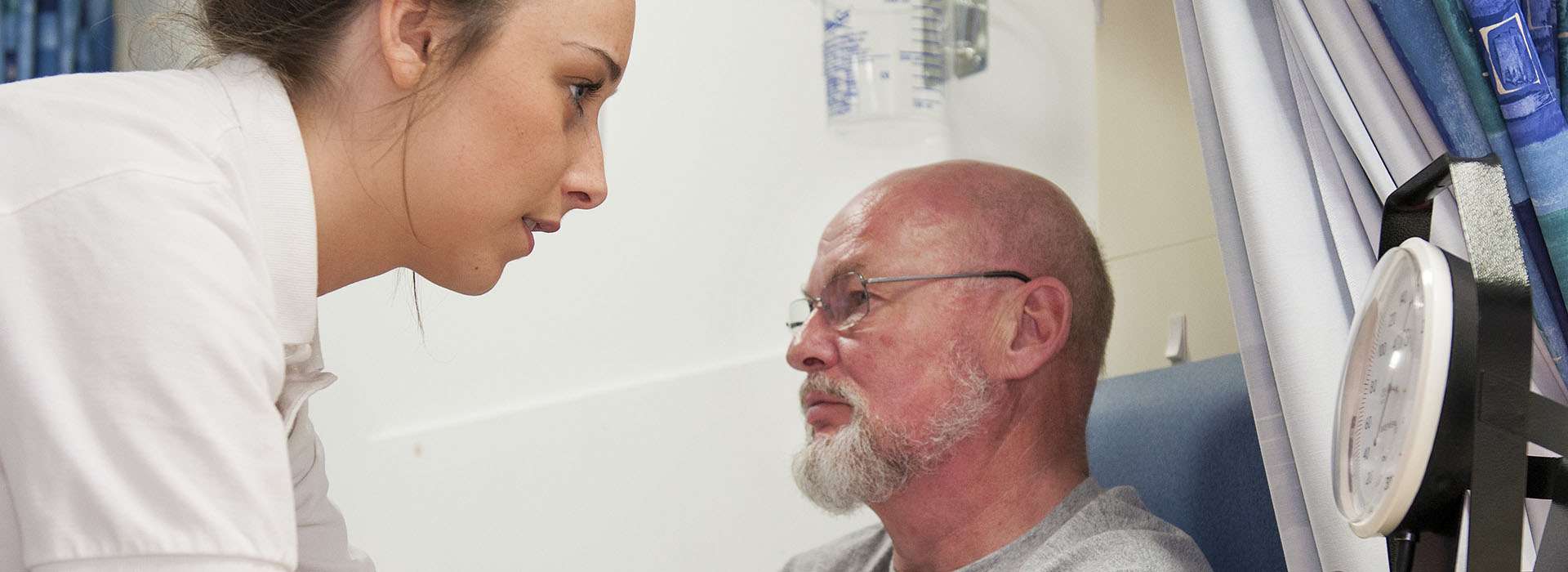 two people in a hospital setting