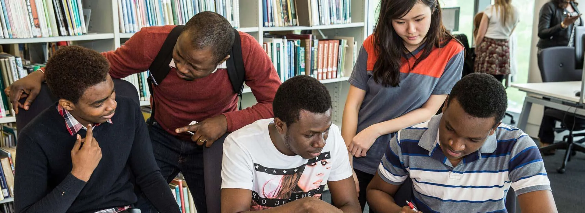 students working together in the library
