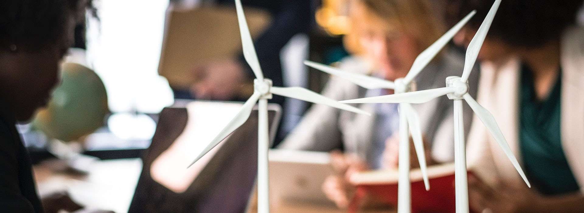 models of wind turbines on a desk