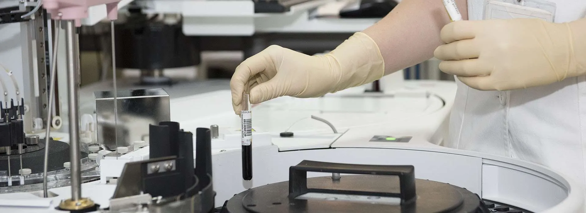 blood sample being placed in centrifuge