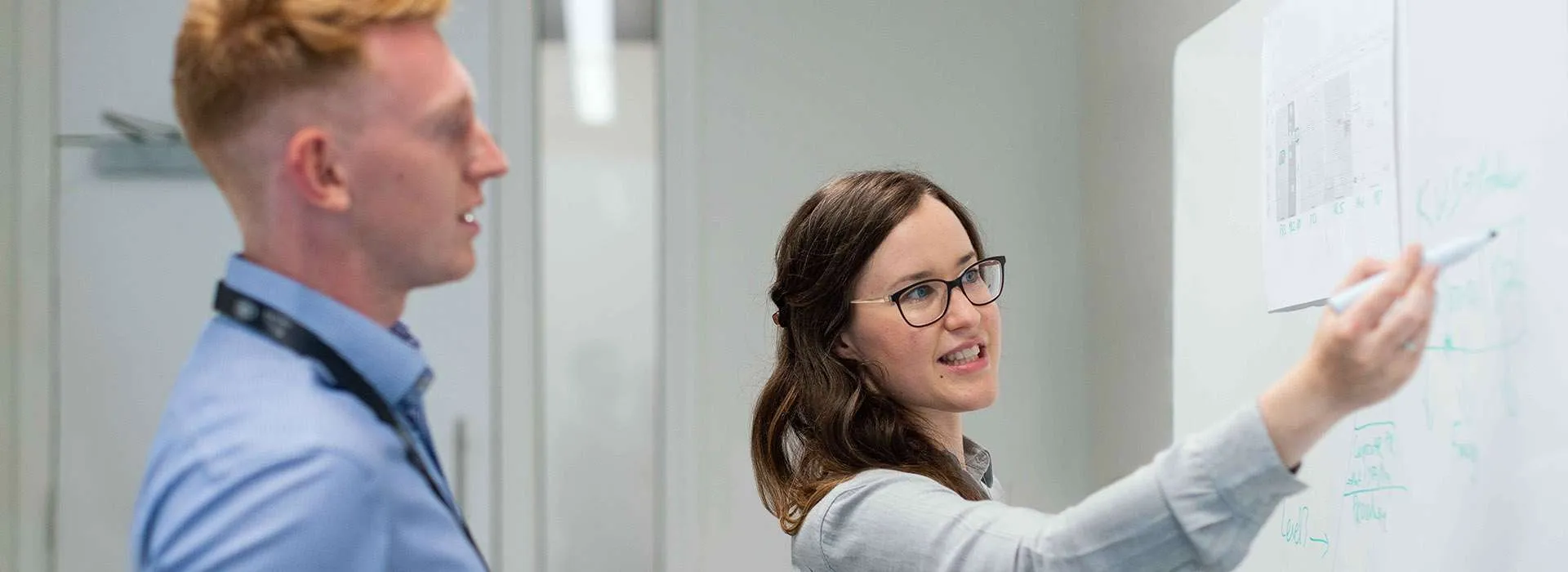 Female using a whiteboard