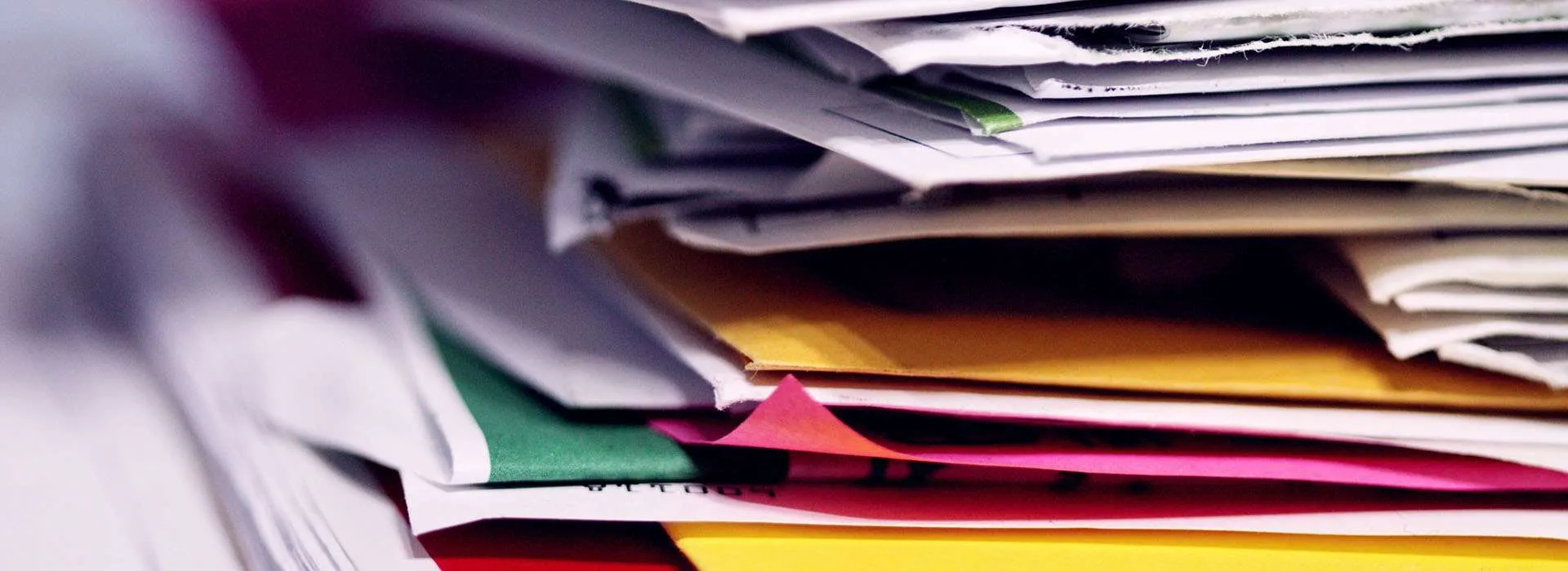 pile of papers and folders