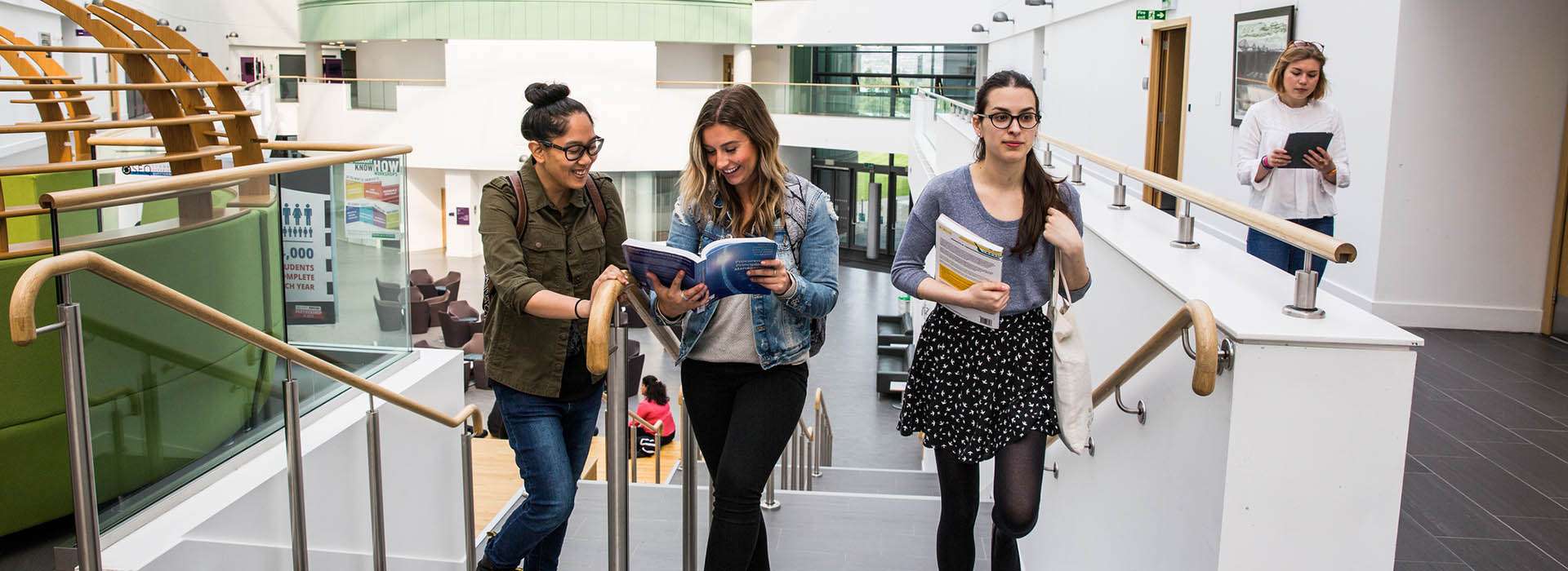students walking up the stairs of the Sir Ian Wood Building