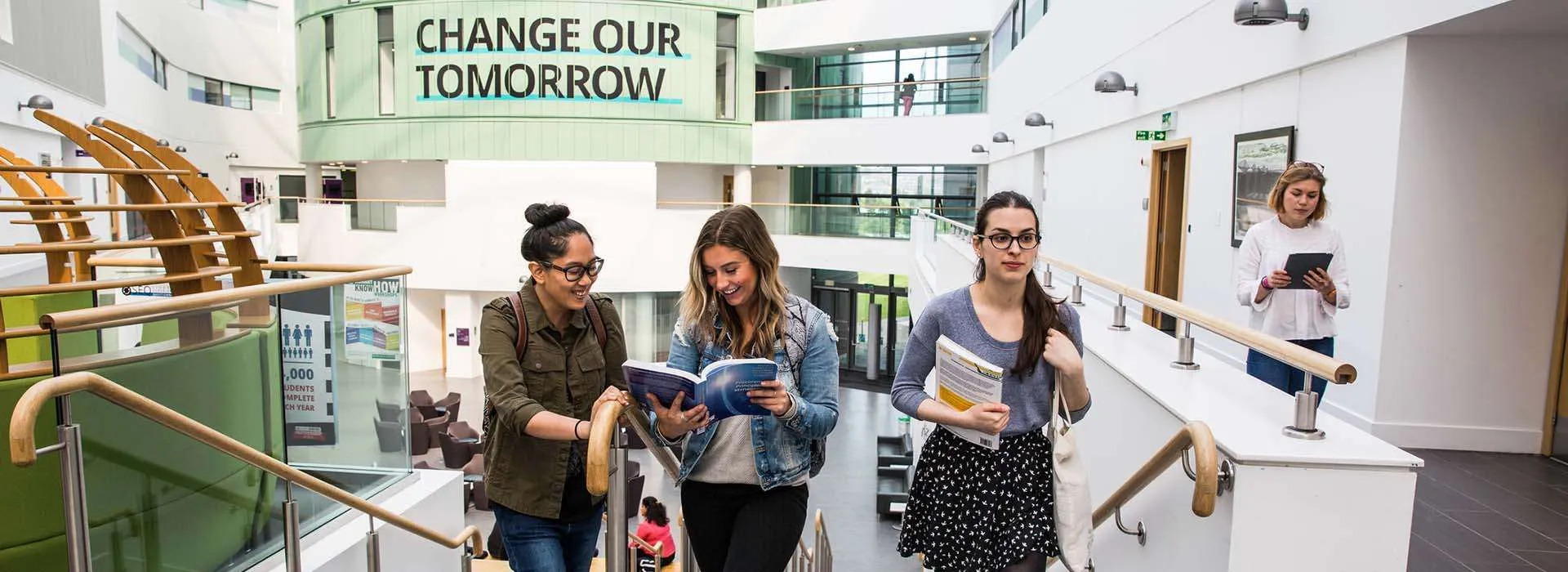 students walking up the stairs of the Sir Ian Wood Building