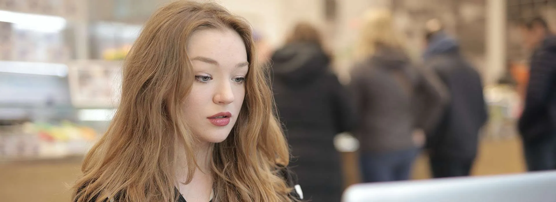 woman typing on laptop
