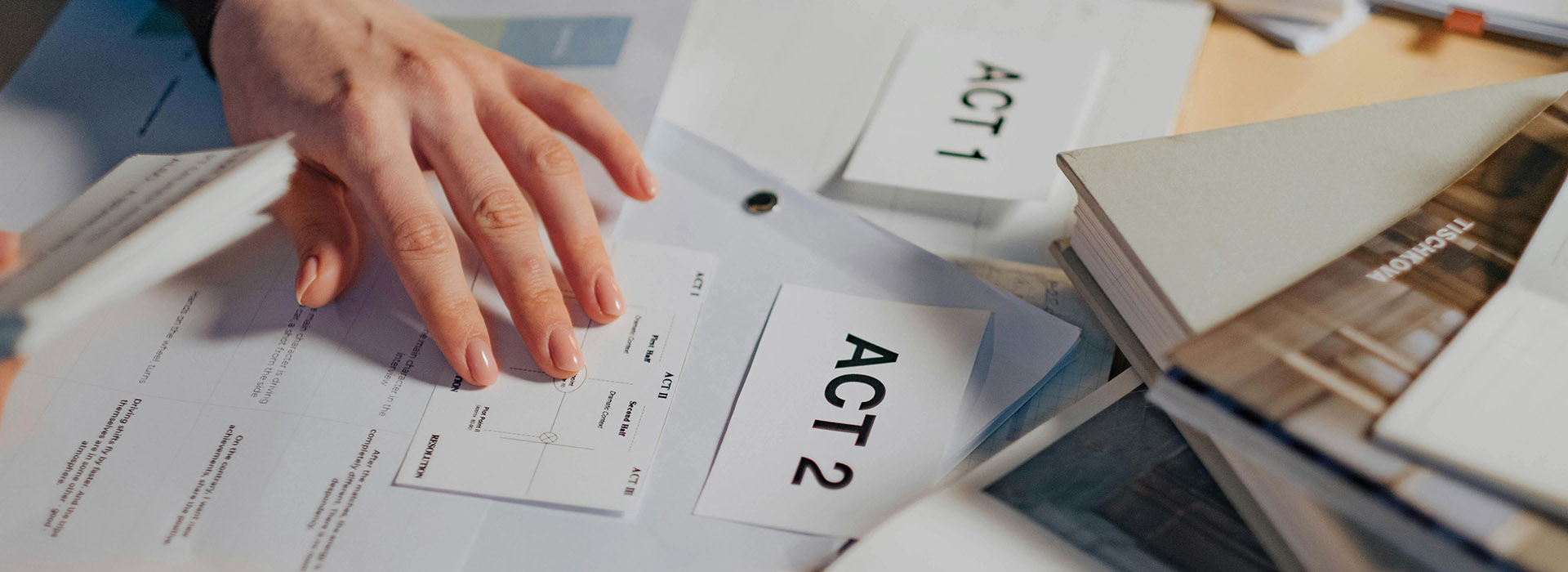 persons hand over some paperwork