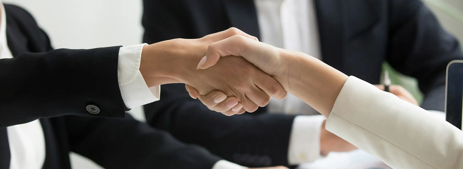 two people shaking hands