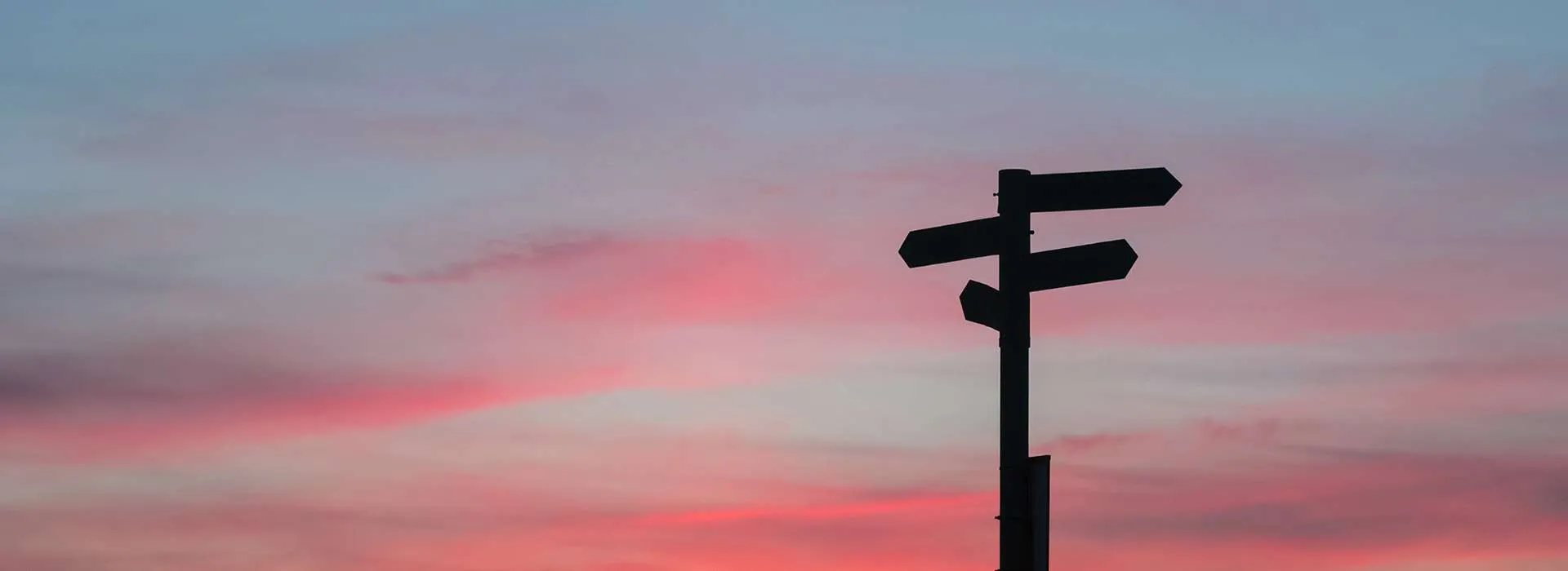 signpost in the sunset