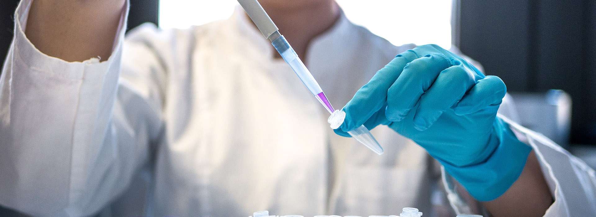 person using lab equipment