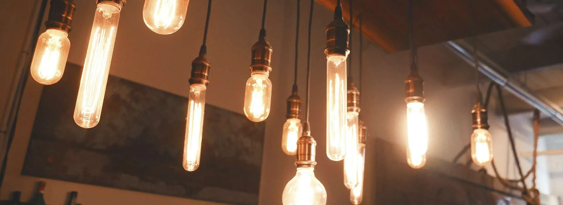 lightbulbs hanging from a dark ceiling