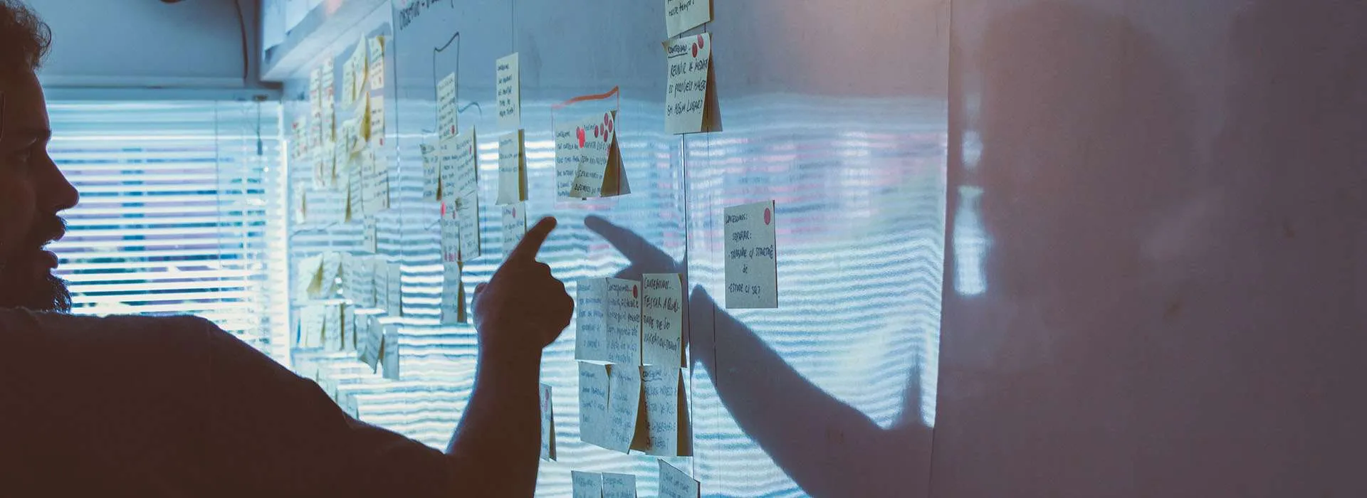person by a whiteboard
