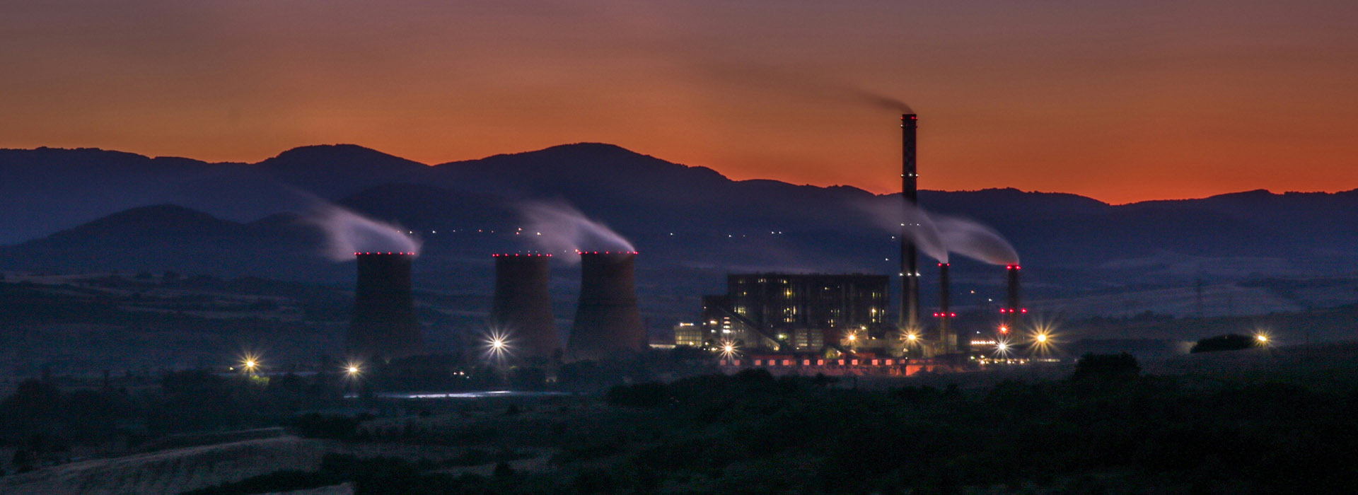 Sunset above a power plant
