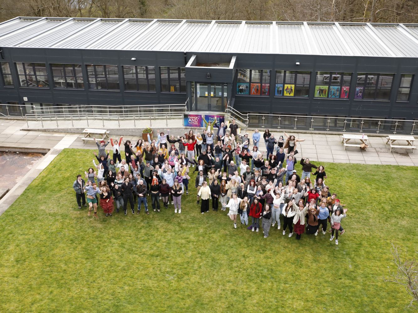 Image shows aerial photo of a group of Gray's School of Art students outside Gray's School of Art's Design Haus