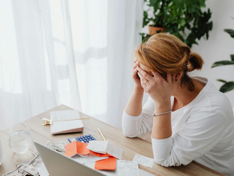 Woman stressing over finances