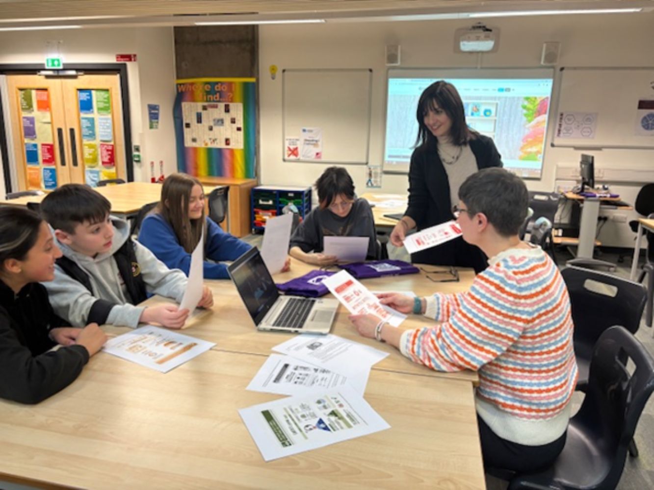 Dr Dina Martzoukou with a group of school pupils.