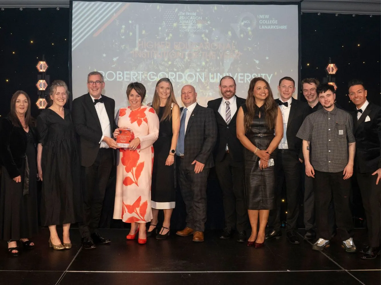 Team RGU pose with the two prizes they won at the Herald Education Awards 2026
