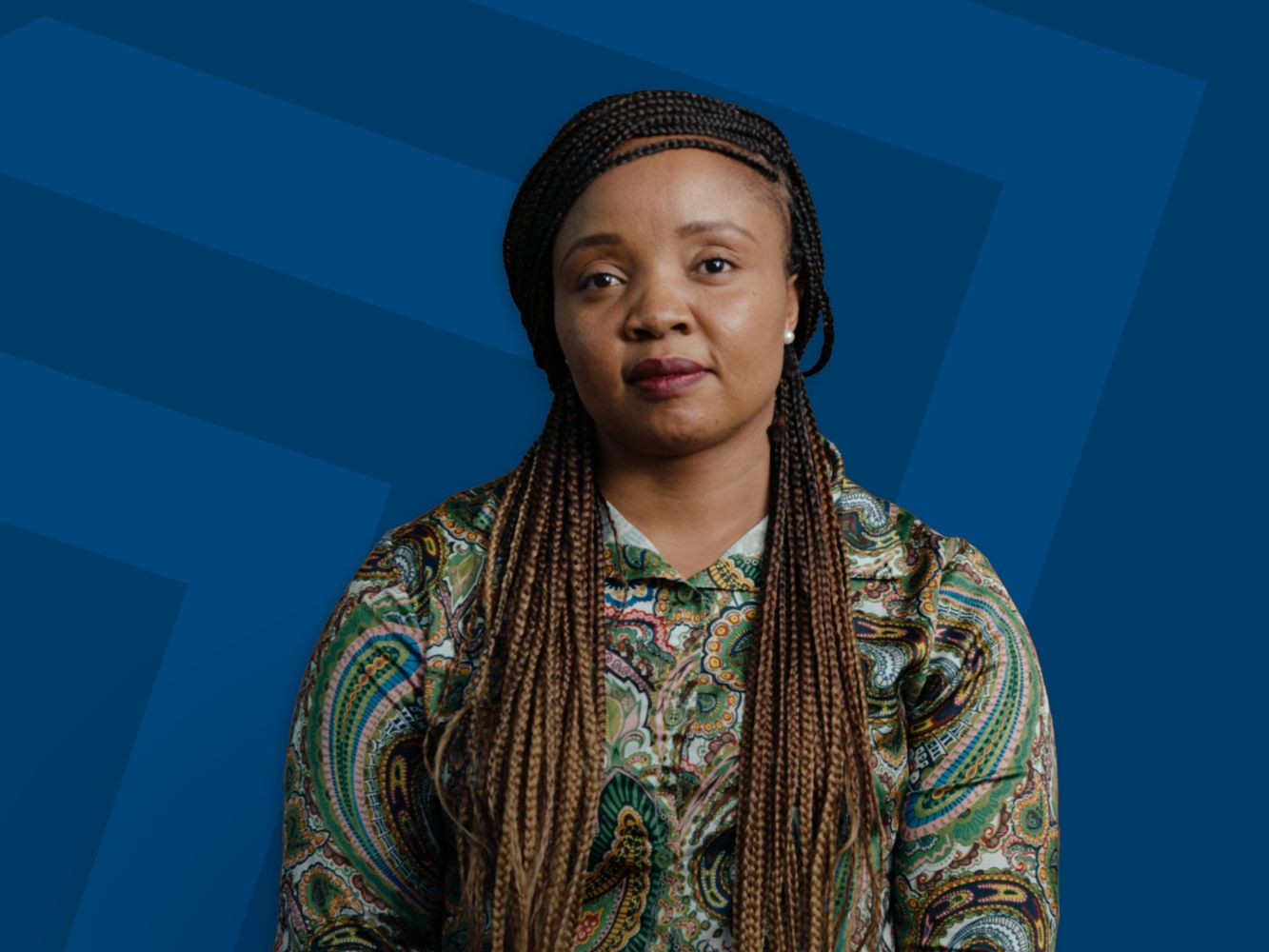 Judith Abolle-Okoyeagu from RGU in front of a blue background