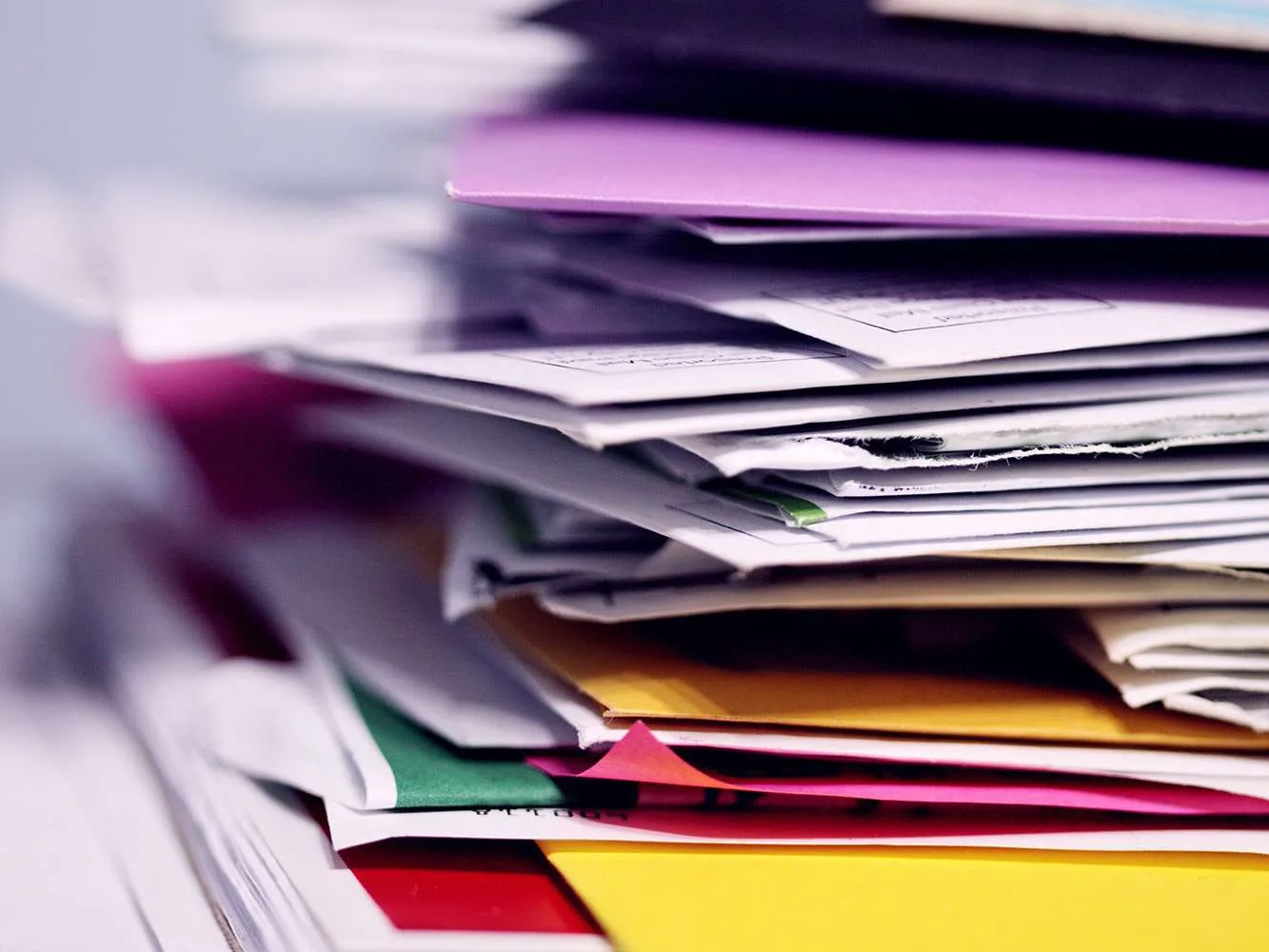 pile of papers and folders