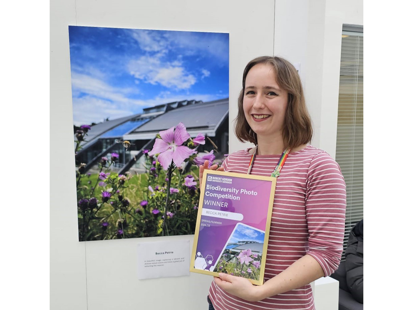 Biodiversity Photo Competition Winner Becca Petrie Becca Petrie holding a certificate next to her photograph