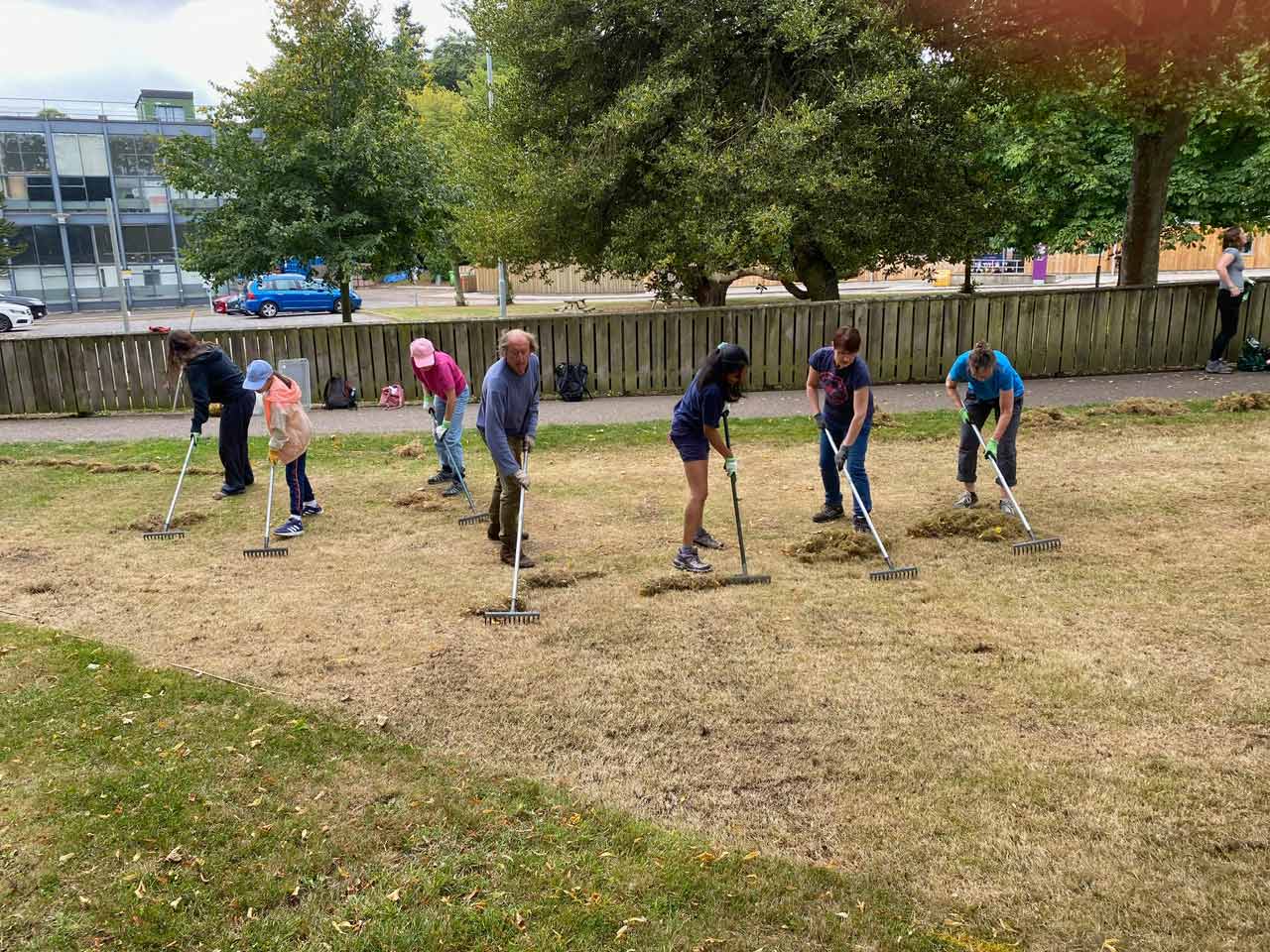 Nectar Networks people outside Gray's School of Art with rakes