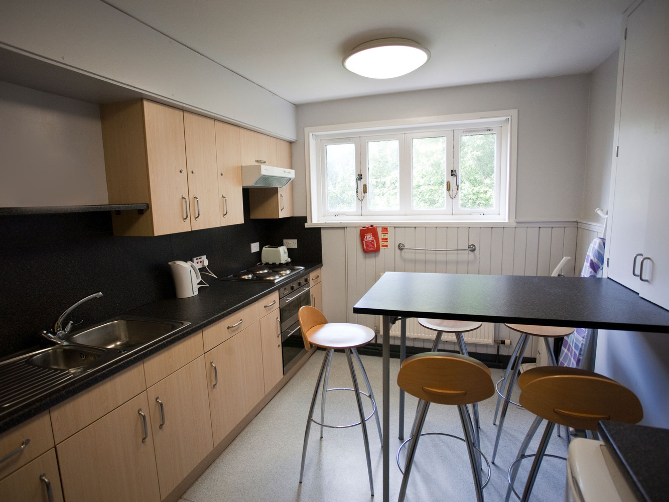 kitchen with various appliances and dining area