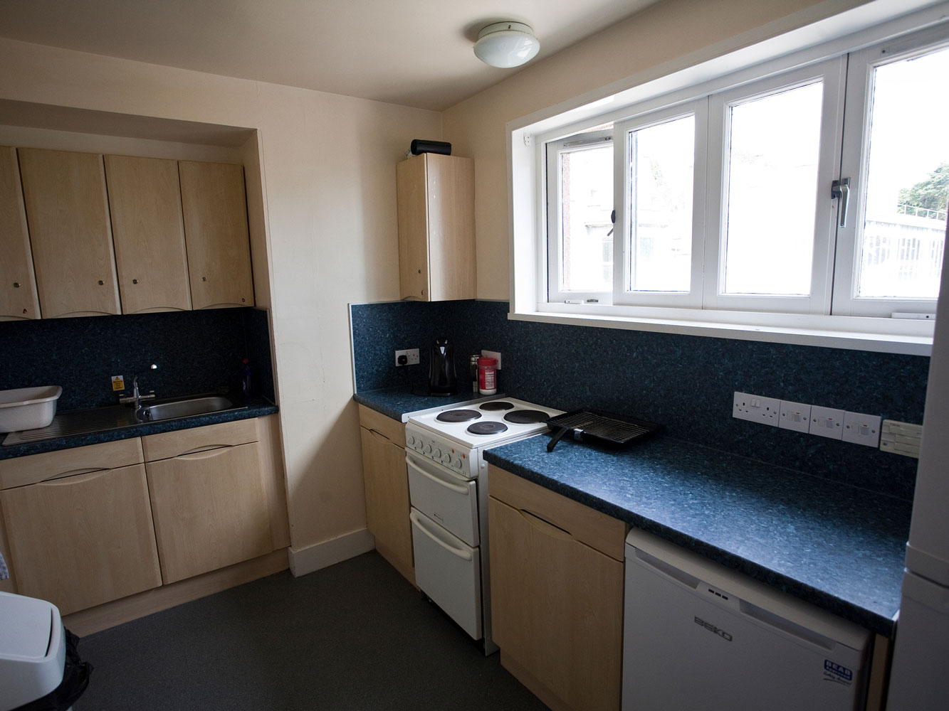 kitchen with oven, dishwasher and appliances