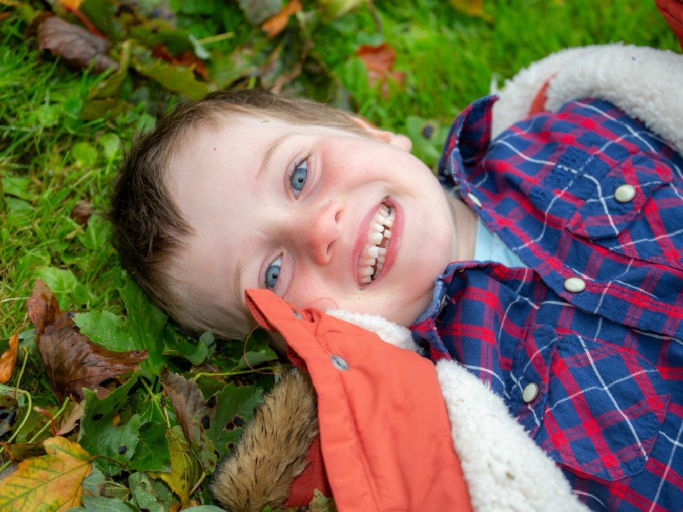 Helen Castle's son playing outdoors