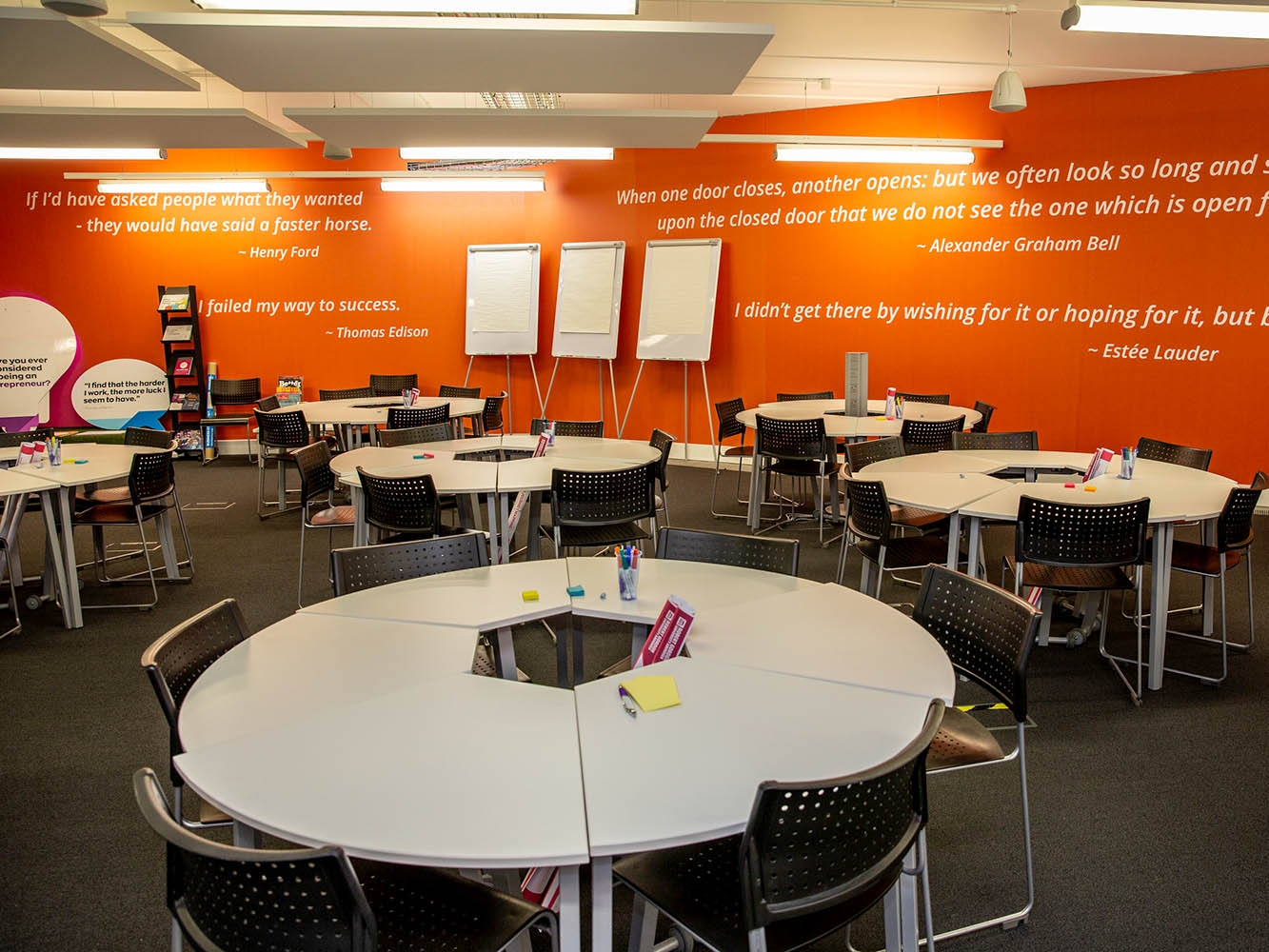 Circular desks with chairs in Innovation Station