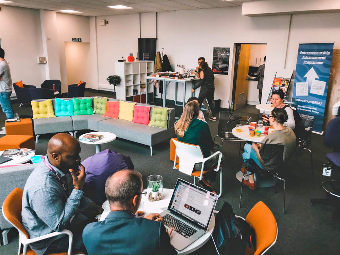 RGU Startup Station within One Tech Hub with people gathered at small desks