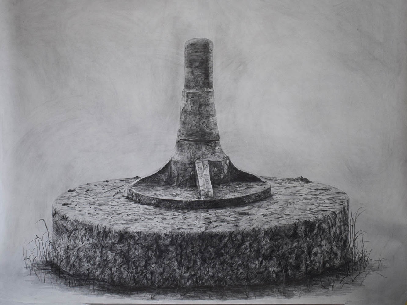 Black and white sketch of a millstone