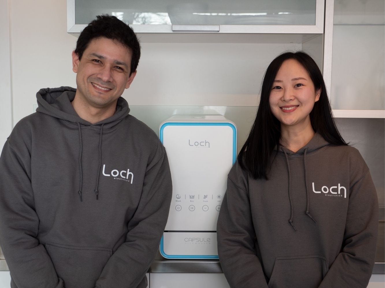Loch Electronics founders pose with the Capsule Dishwasher