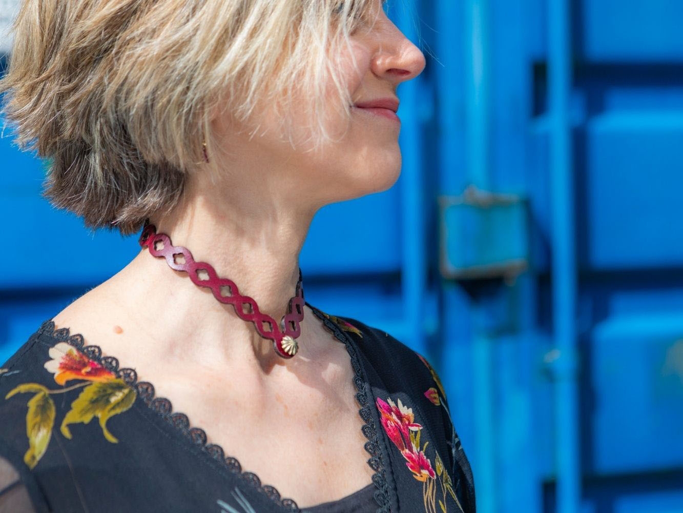 Intricately designed handmade necklace worn on model