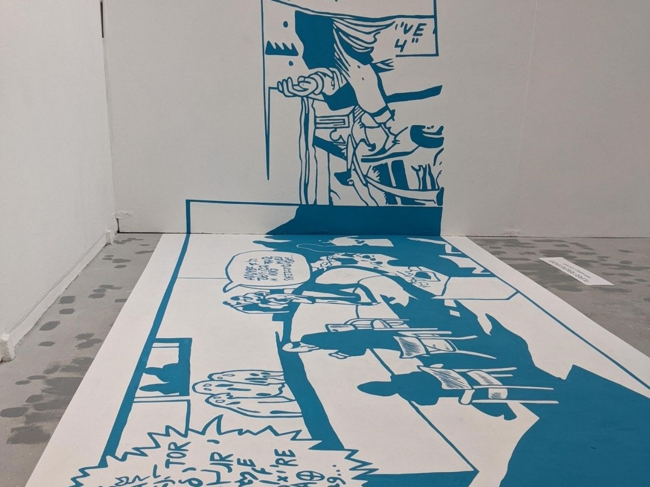 Comic-style blue and white painting on floor and wall