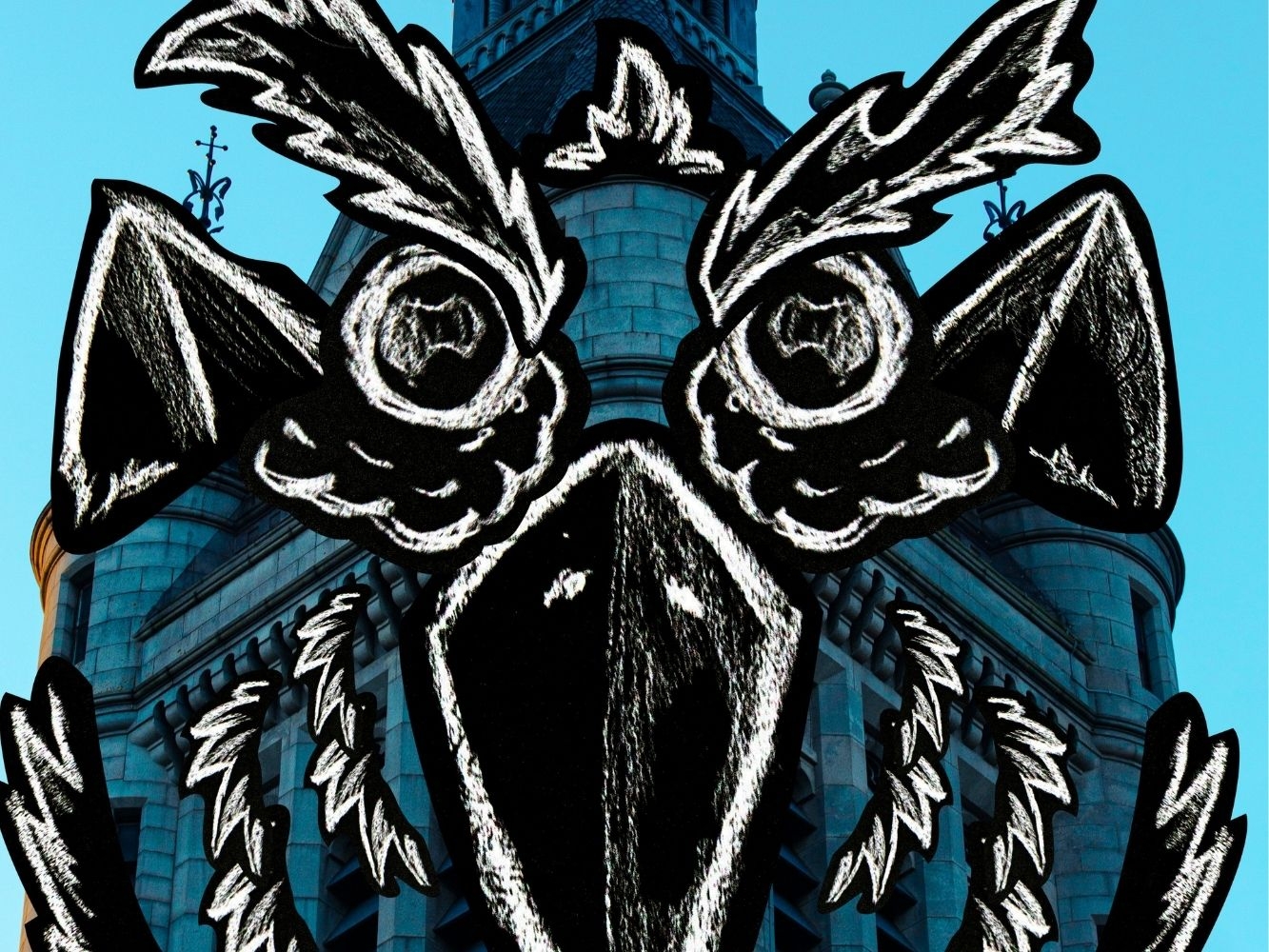Photograph of building turret with bird-like features illustrated over it in black and white