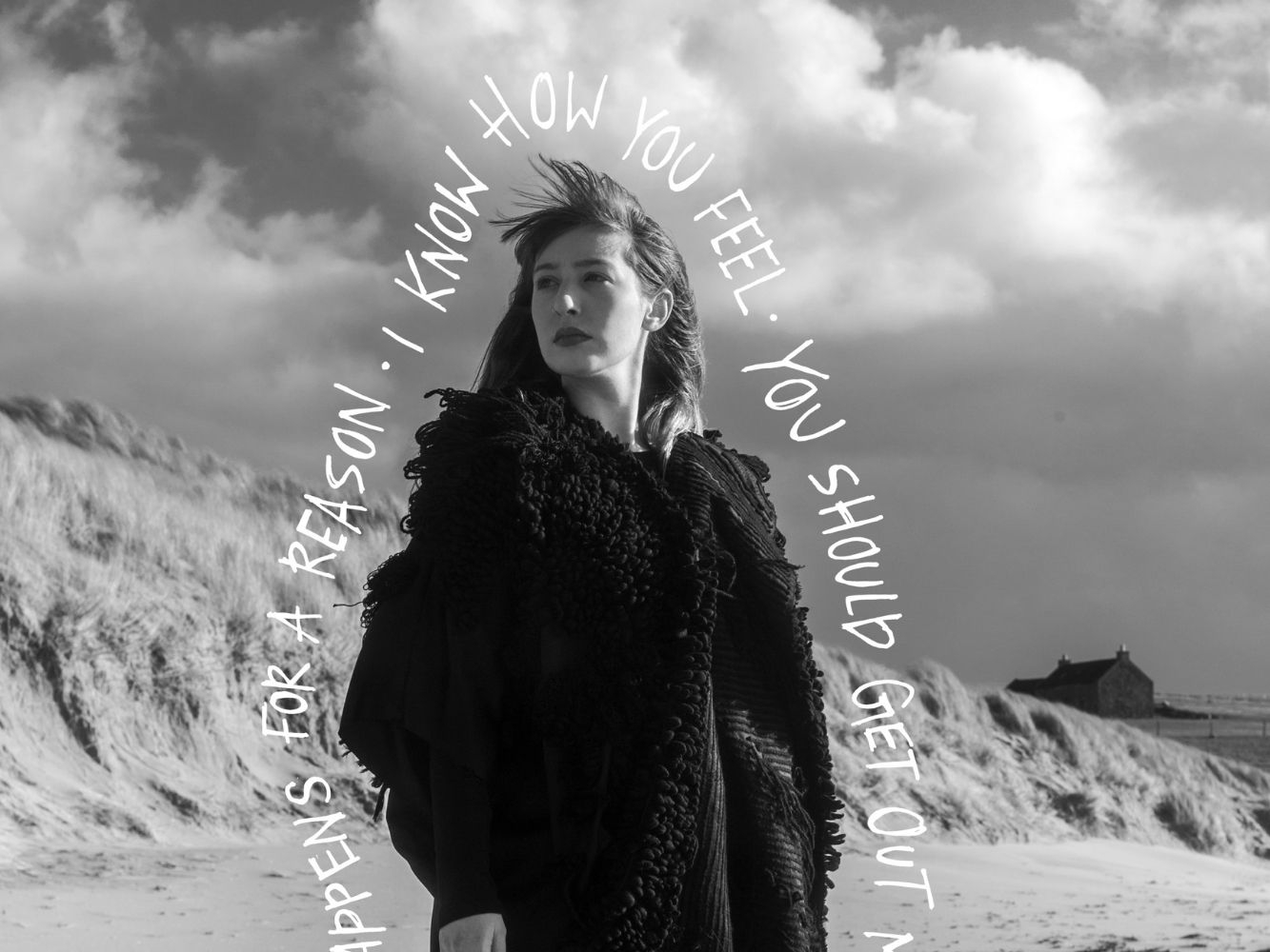 Keira Thomson standing on a beach, she is lined by 'damaging phrases'