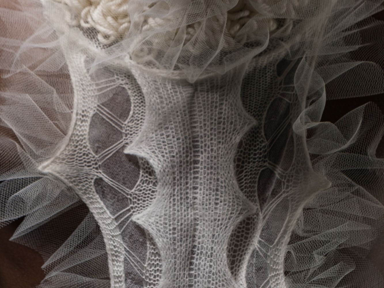 Close up of knitted clothing item designed to look like a marine organism