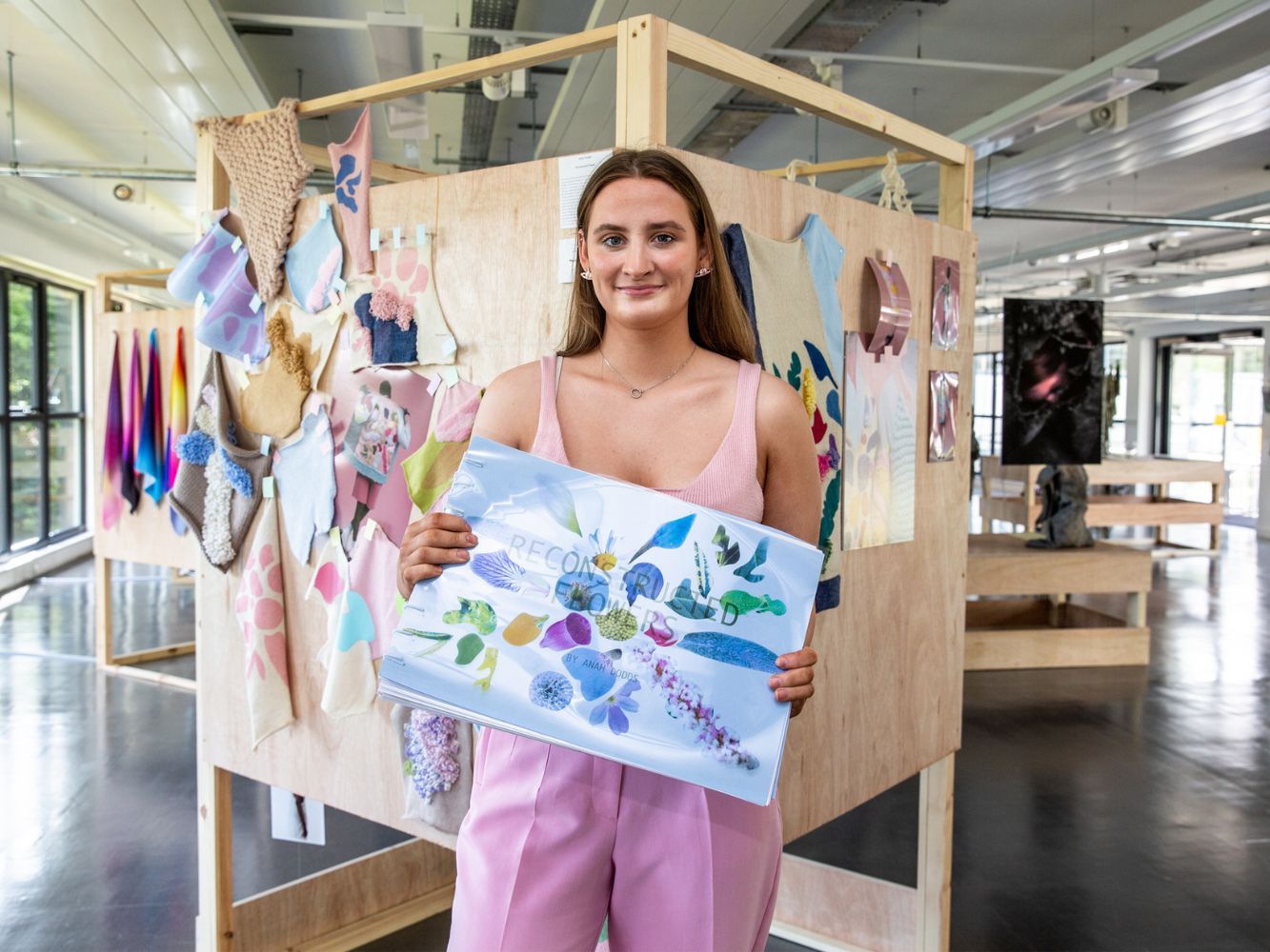 Anah Dodds poses with artwork