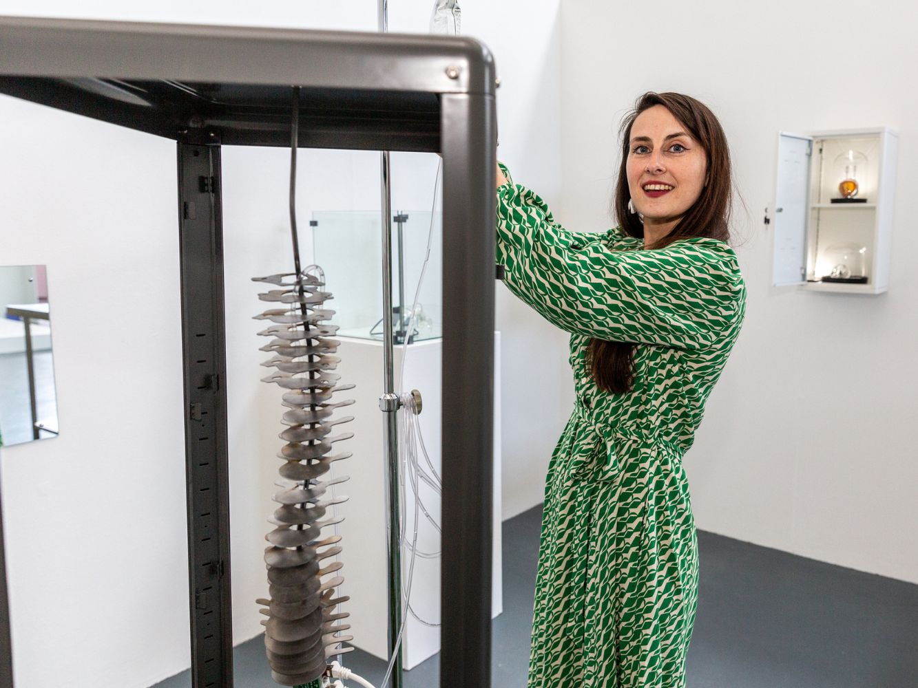 Emmajane Kingaby poses with artwork