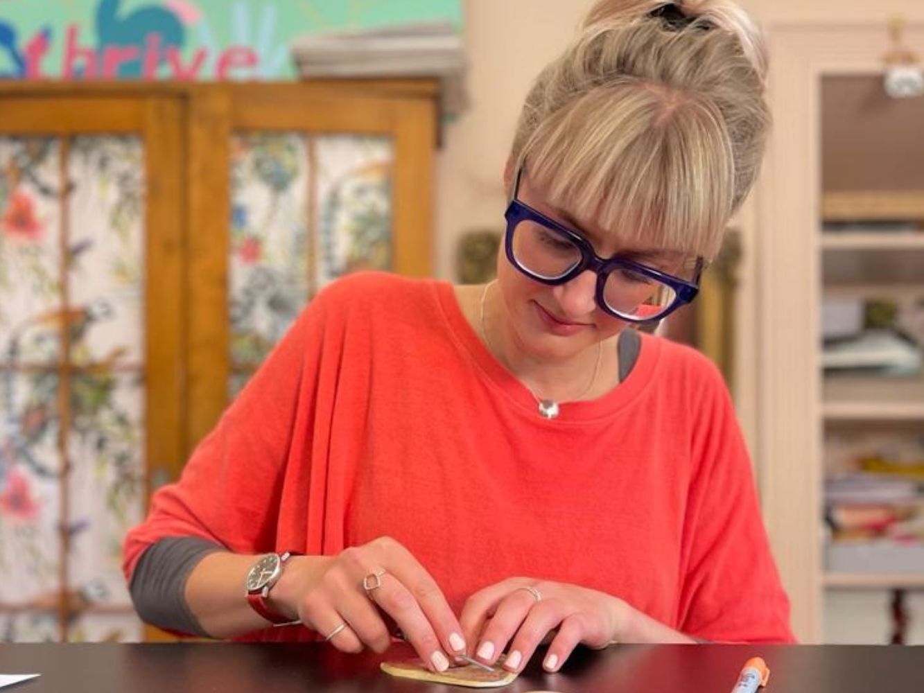 Alison Shearer working on art piece