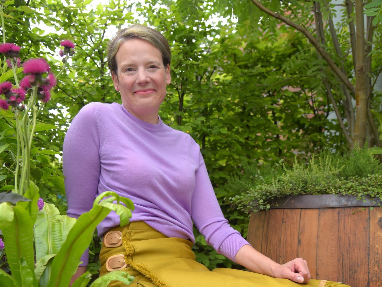 Andrea Chappell posing in garden