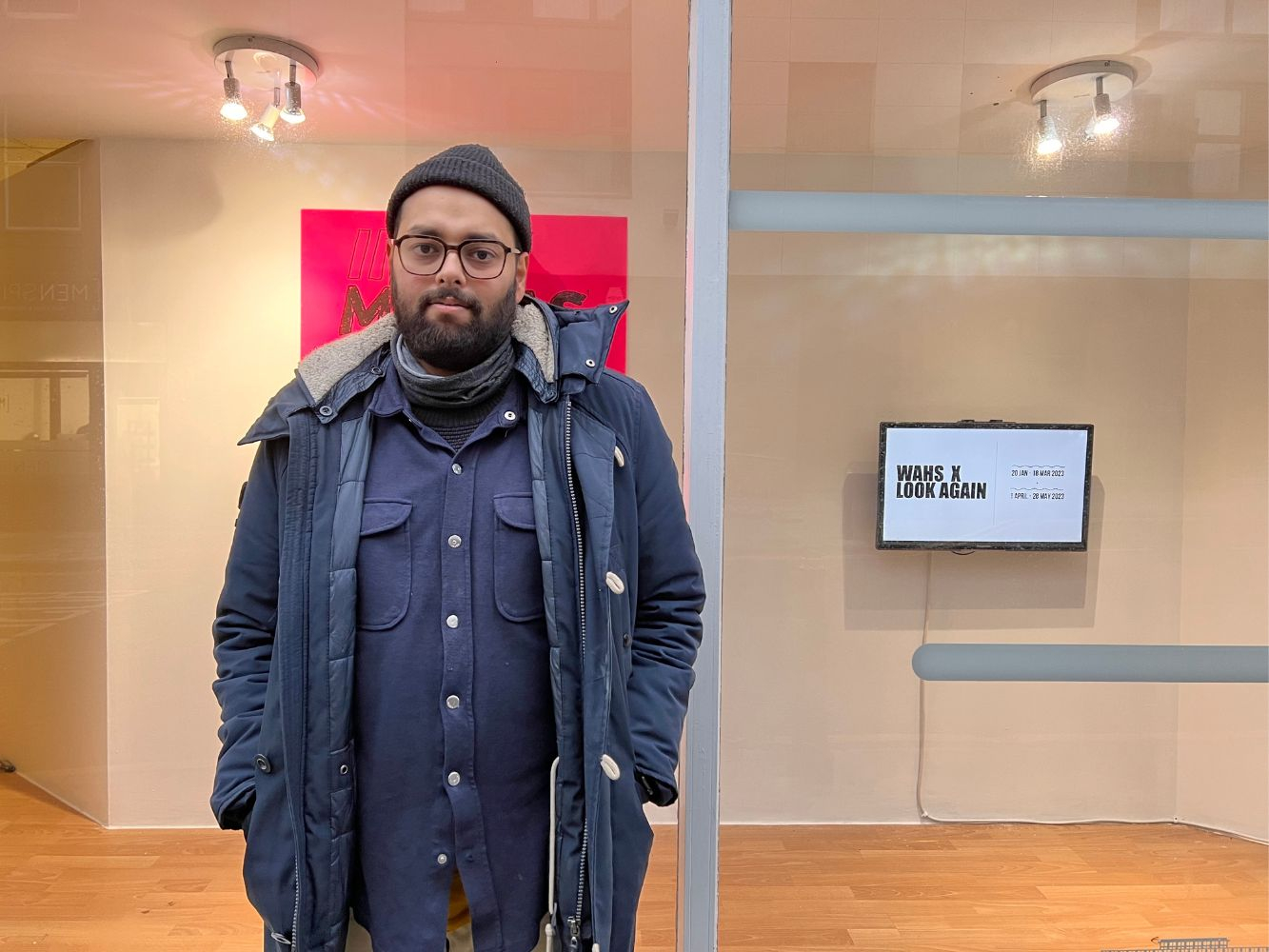 Rudy Kanhye stands outside Look Again creative unit