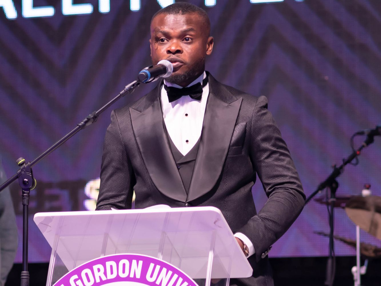 Joel Adebanjo, outgoing Sports President, on stage