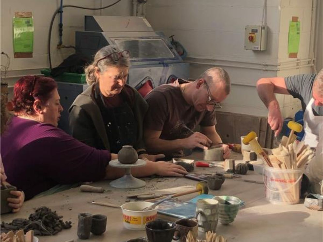 Two people engaging in a creative workshop