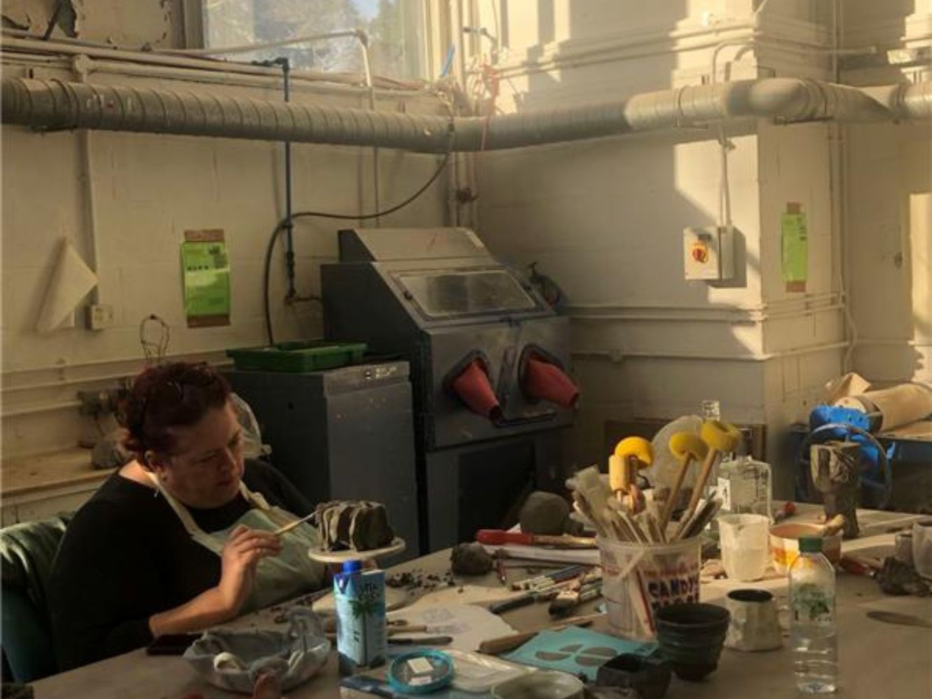 Someone engaging with a creative workshop at Gray's