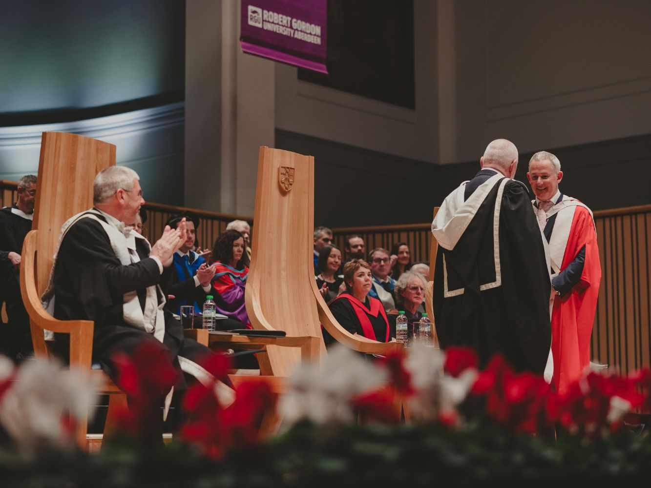 Mark Logan receiving his degree from Principal Prof. Steve Olivier