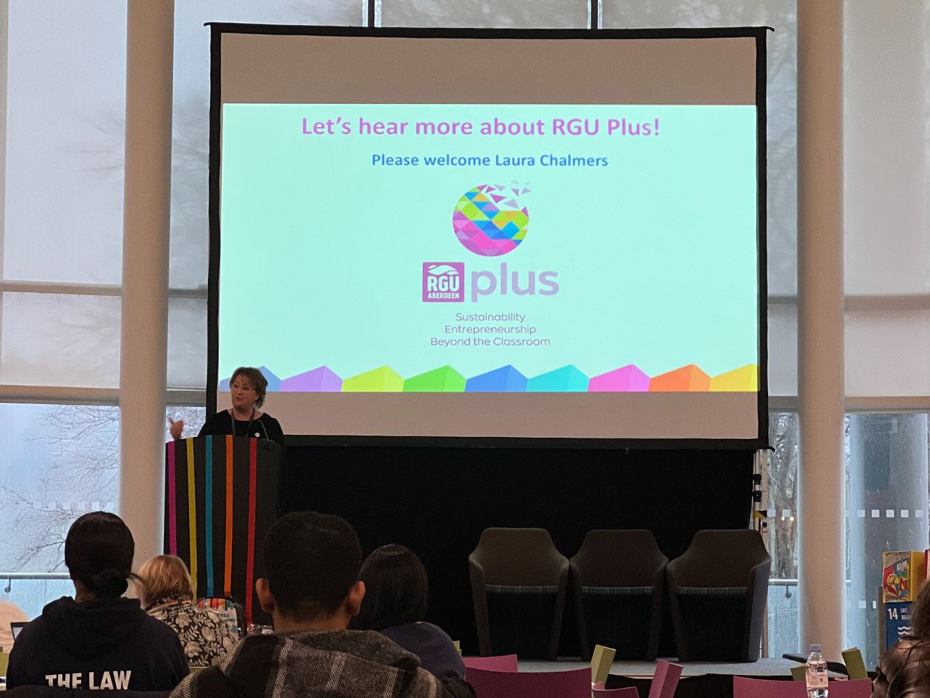 Laura Chalmers presenting RGUplus